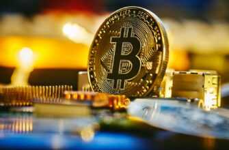 a bitcoin sitting on top of a computer chip