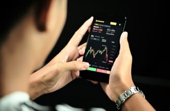 person holding black android smartphone