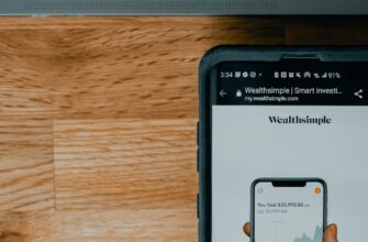 black samsung android smartphone on brown wooden table