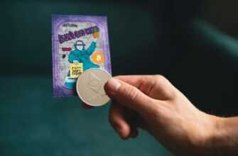 a person holding a coin in their hand