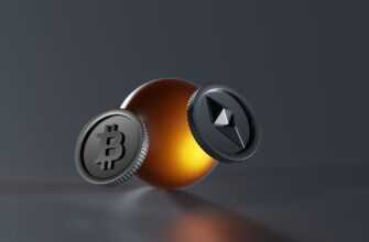 a bitcoin and a lite up coin on a table